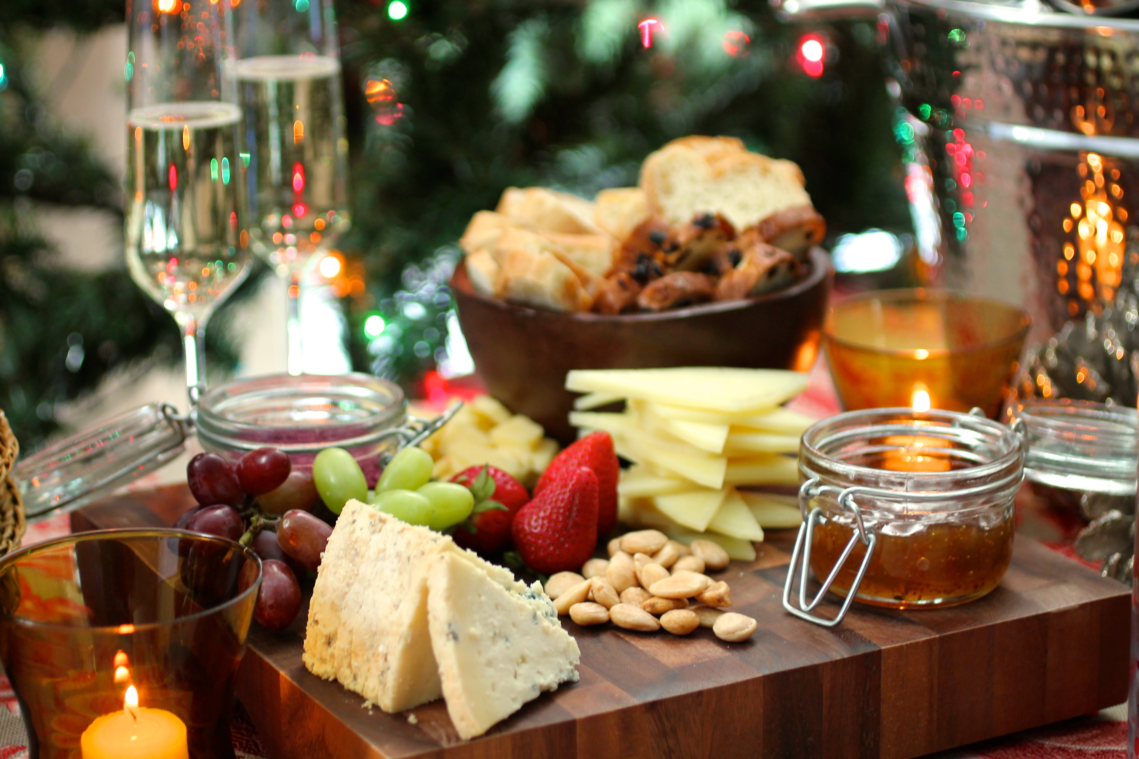 cheese board with fruit and nuts for the holidays