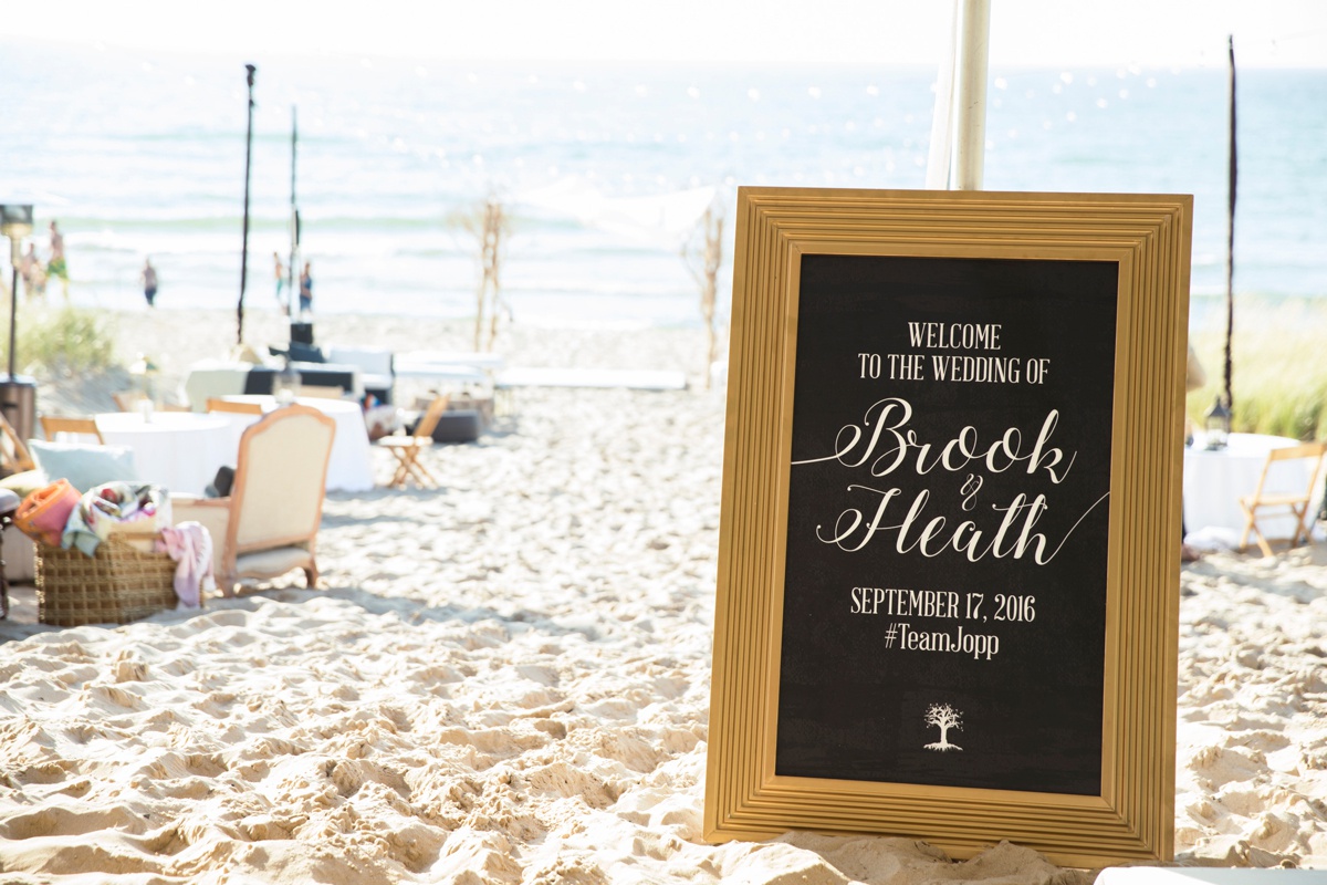 Beautiful hand-lettered sign at Brook and Heath's South Haven wedding