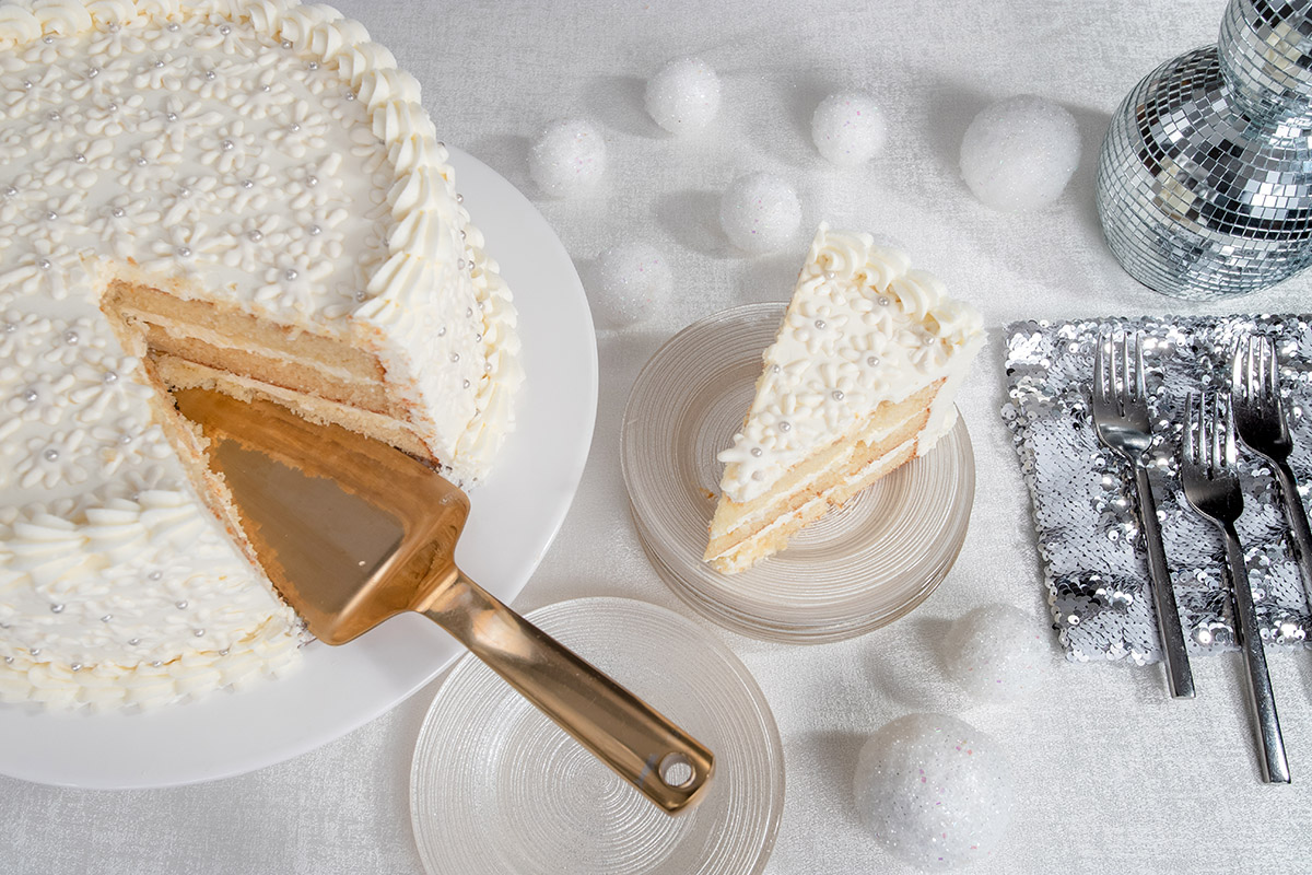 White Cake and table set up by Catering By Michaels